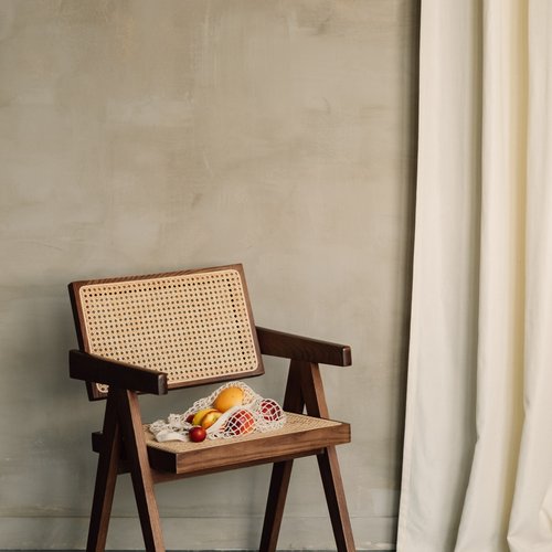 brown chair in minimalist setting