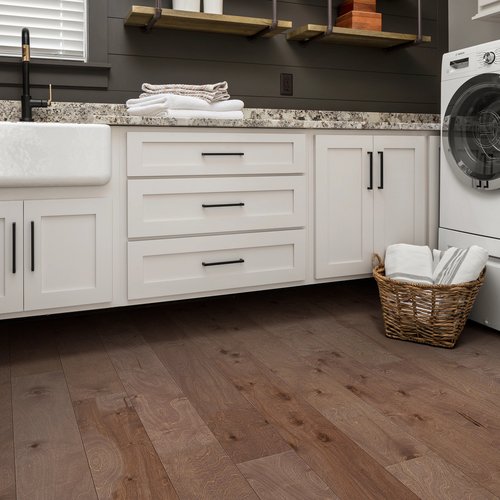 Laundry room with engineered hardwood flooring from Carneys Carpet Gallery in Jeffersontown, KY